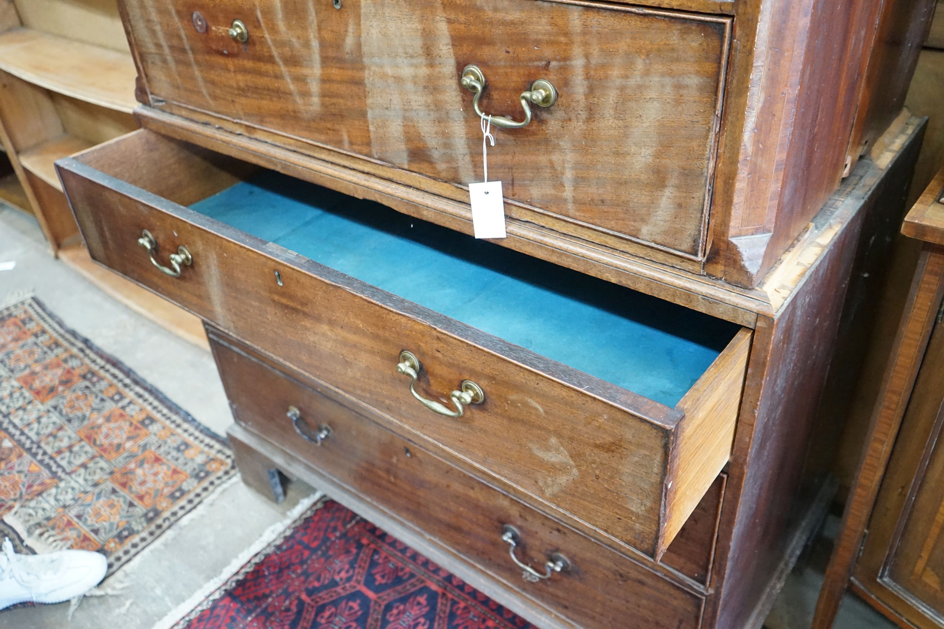 A George III chest on chest, width 106cm, depth 56cm, height 189cm